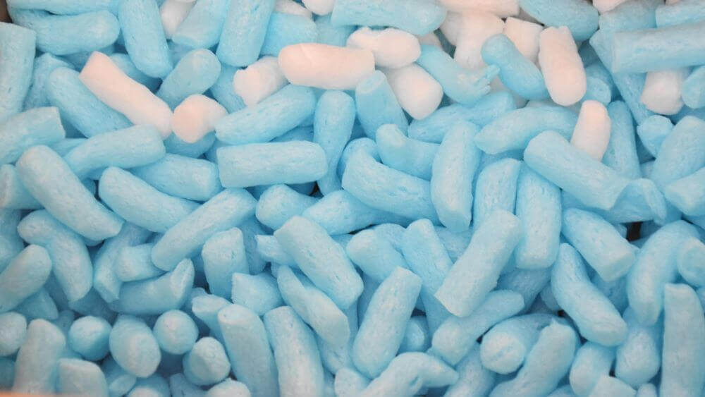 Image of blue and white plastic free packing peanuts